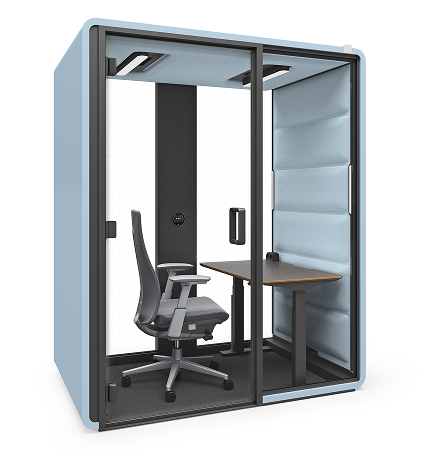 Hushfree Work acoustic pod with an office chair and a sit-stand desk