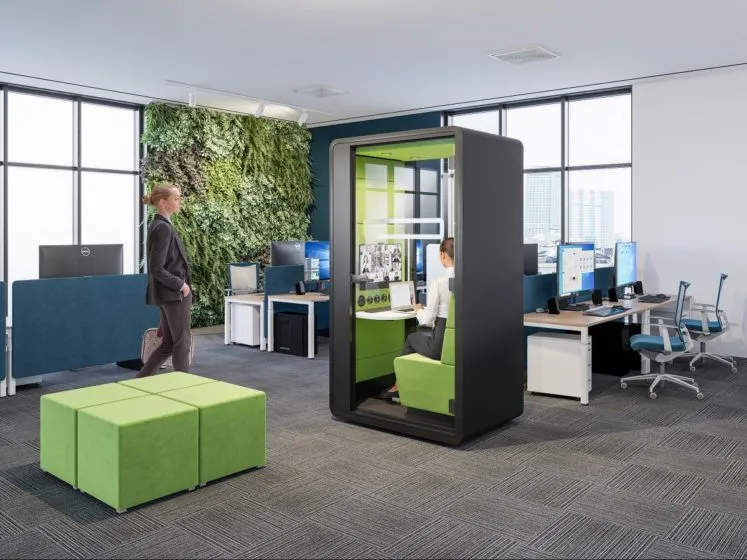 A 1-person video call pod for bustling office spaces. HushHybrid.