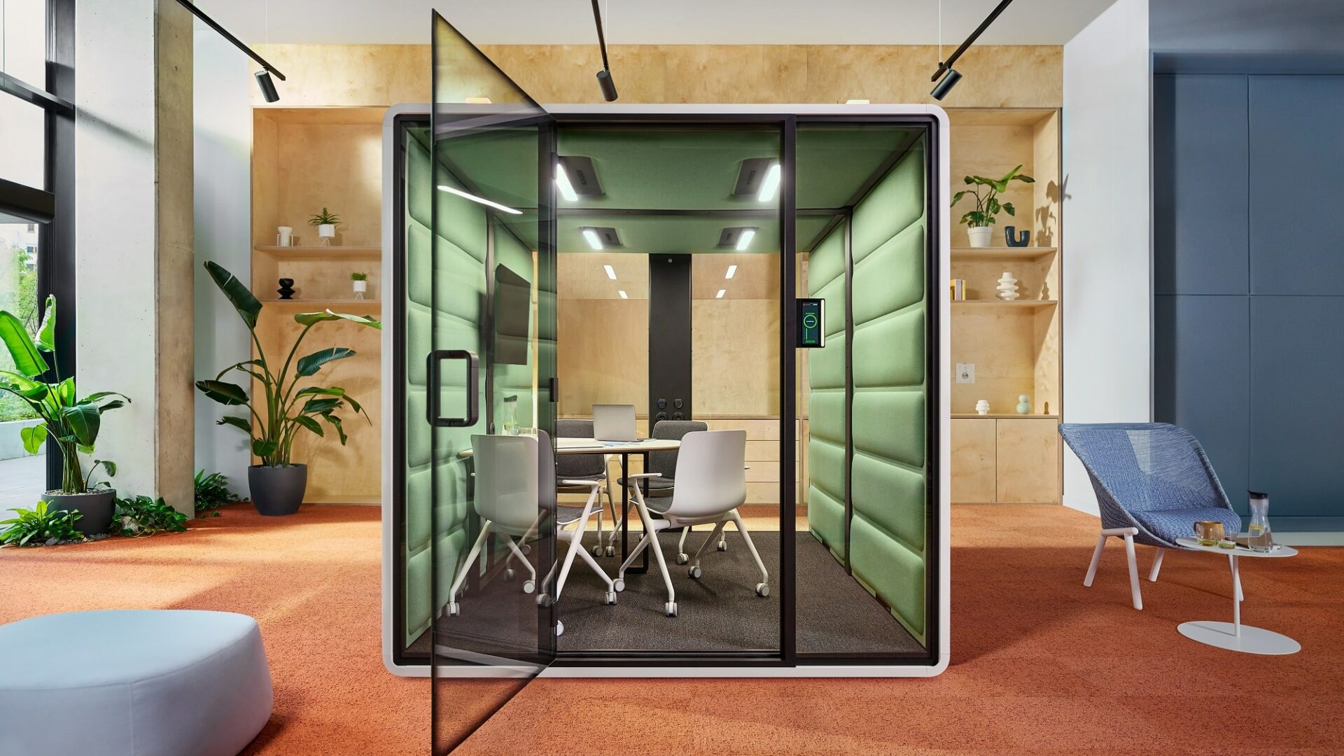 Hang a monitor on hushFree.L's central column to allow for video conference meetings of ease.
